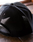 backerton X Sticks & Stones - "FLYING MOTORCYCLE" Archie Trucker Hat in Black