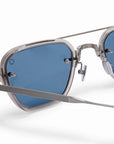 AKONI - "JURA" Sunglasses in Silver and Crystal Grey with Dusty Blue Lenses