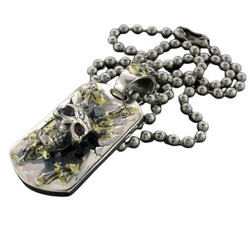 DOUBLE CROSS by Travis Walker - "BREAK OUT SKULL" Dog Tag in 18K Gold and Garnets