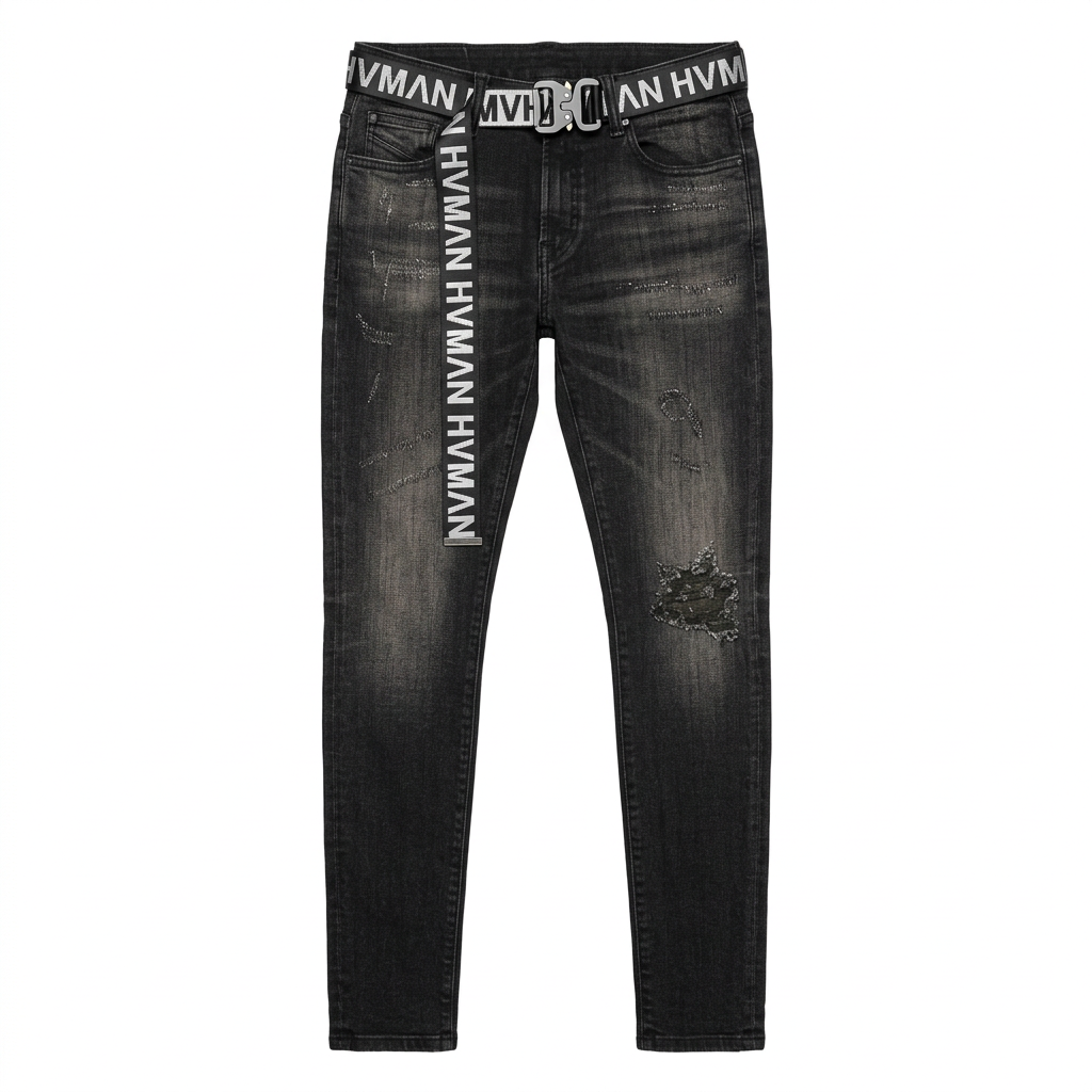 Front flat lay of HVMAN “STRAT” Black Shale super skinny jeans with included HVMAN-branded belt on white