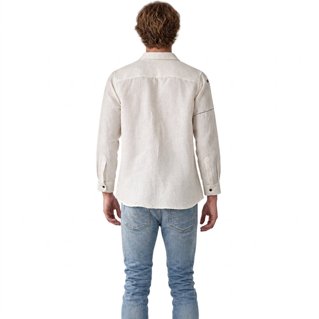 Back view of model wearing Live Linen "Atticus" Angora White linen shirt with light blue jeans