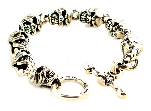 Double Cross by Travis Walker – Large Multi Skull Sterling Silver Bracelet